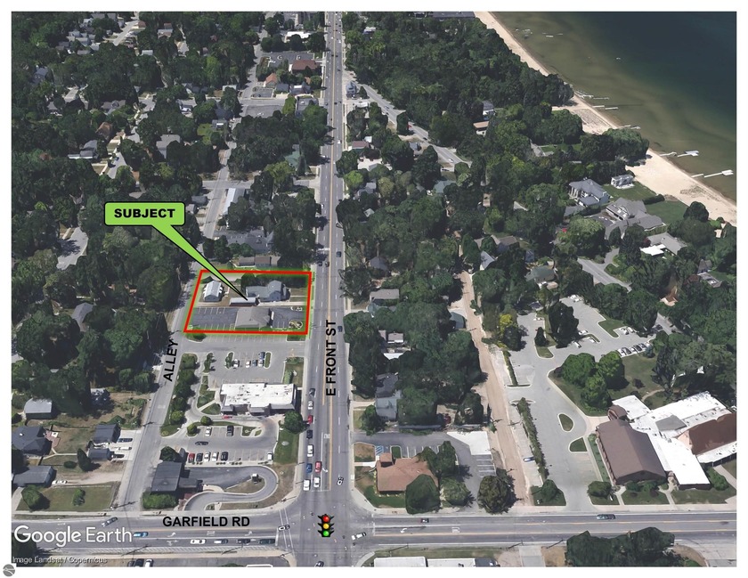 Here is an opportunity to purchase and develop a large 0.63 Acre - Beach Commercial for sale in Traverse City, Michigan on Beachhouse.com