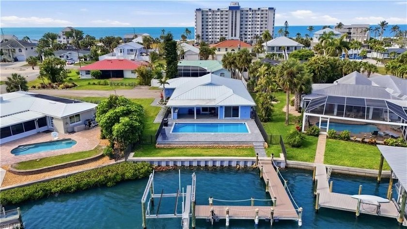 Completely reimagined waterfront residence in Laguna Shores - Beach Home for sale in Fort Myers Beach, Florida on Beachhouse.com