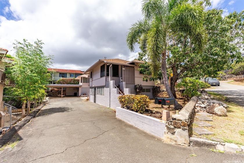 Now priced at $350,000 below assessed value!! Very rare! Two - Beach Home for sale in Honolulu, Hawaii on Beachhouse.com