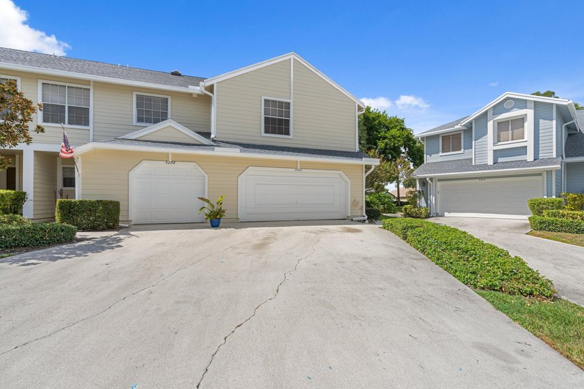This spacious corner unit with a private two-car garage offers - Beach Townhome/Townhouse for sale in Boca Raton, Florida on Beachhouse.com