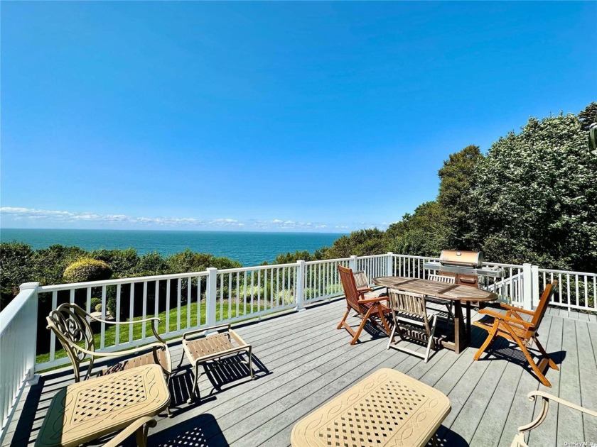 This stunning three-level waterfront home offers luxurious - Beach Home for sale in Riverhead, New York on Beachhouse.com