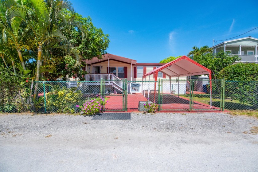 Spacious 4-Bedroom, 3-Bath Home on Expansive Lot with Fruit - Beach Home for sale in Stock Island, Florida on Beachhouse.com