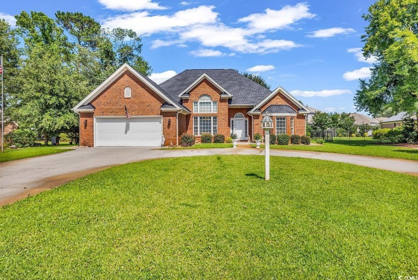 ALL BRICK BEAUTY!  This custom built home offers 4 bedrooms and - Beach Home for sale in Surfside Beach, South Carolina on Beachhouse.com