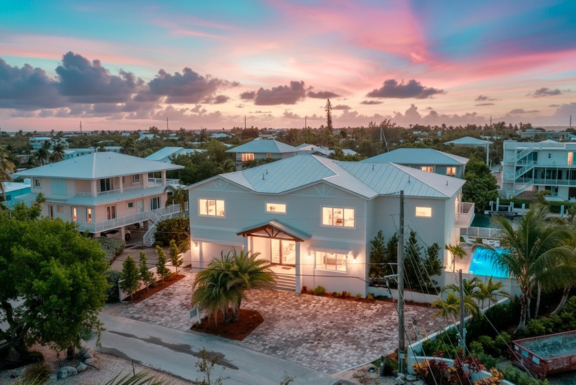 Welcome to 194 Buttonwood Lane, a rare waterfront sanctuary - Beach Home for sale in Lower Matecumbe Key, Florida on Beachhouse.com