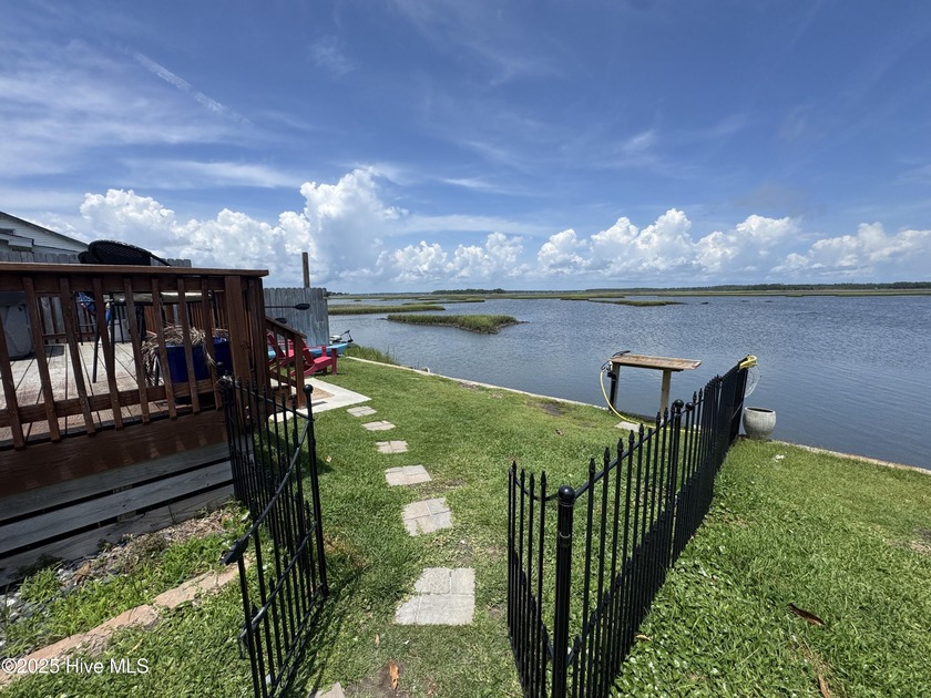 This fully furnished 2-bedroom waterfront cottage is a rare find - Beach Home for sale in Cedar Point, North Carolina on Beachhouse.com