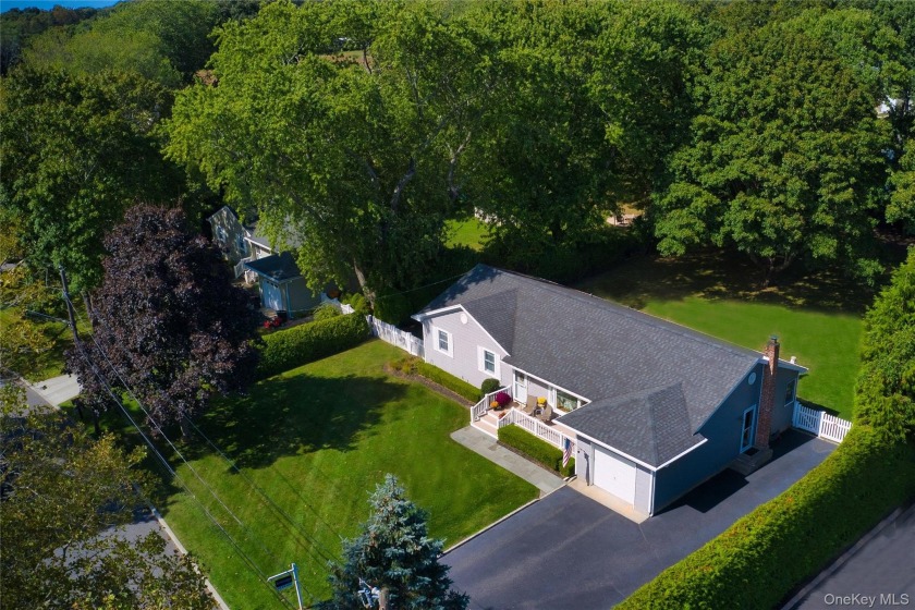 Welcome home to this spacious and well maintained home tucked - Beach Home for sale in East Moriches, New York on Beachhouse.com