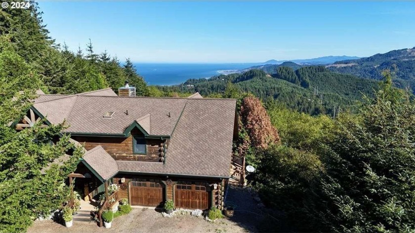 This stunning 3-bedroom, 3-bath custom log cabin offers - Beach Home for sale in Gold Beach, Oregon on Beachhouse.com