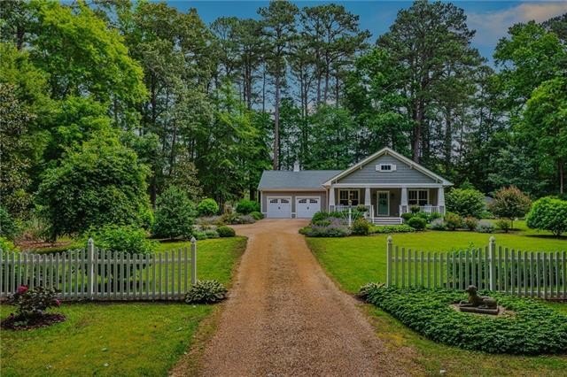 Tucked away in a serene, park-like setting on protected Wilson - Beach Home for sale in Gloucester, Virginia on Beachhouse.com
