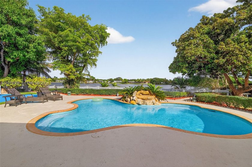 Lakefront living in the heart of Kendall. Situated on a rare 15 - Beach Home for sale in Miami, Florida on Beachhouse.com