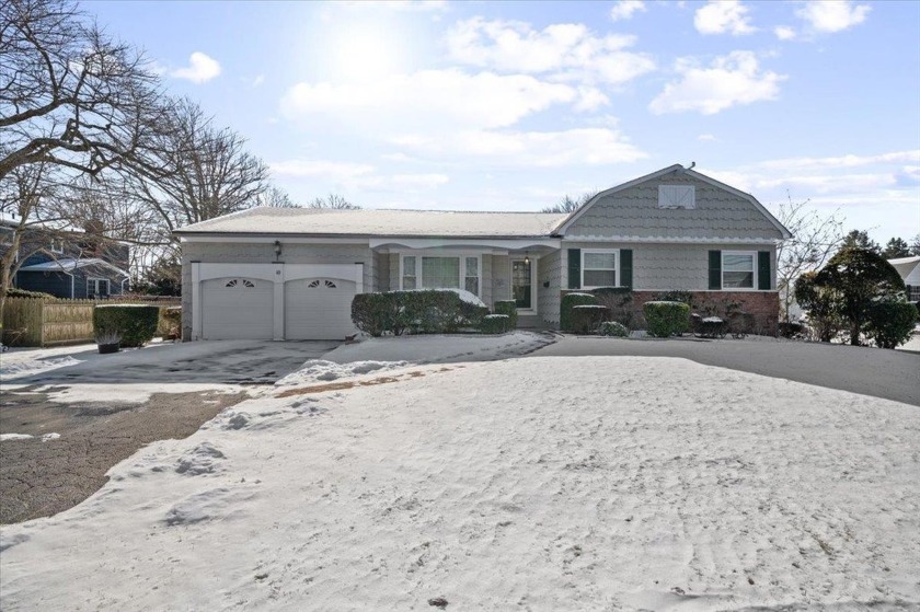 Nestled in the Saxon Cove Community, this charming 3-bedroom - Beach Home for sale in Bay Shore, New York on Beachhouse.com