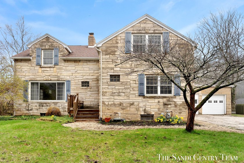 Full of timeless character and ideally located near the heart of - Beach Home for sale in Grand Haven, Michigan on Beachhouse.com