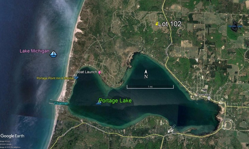 Prime real estate to build your dream home in the prestigious - Beach Lot for sale in Onekama, Michigan on Beachhouse.com