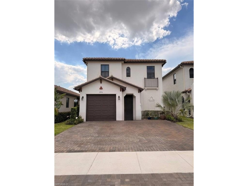 Welcome to this beautiful two-story Spanish-style single home - Beach Home for sale in Naples, Florida on Beachhouse.com