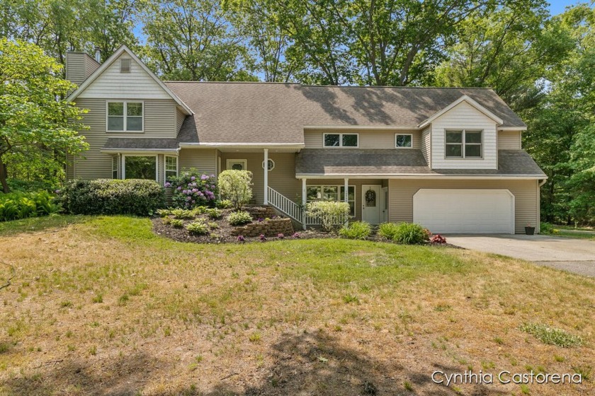 Tucked away on 2 private acres on the Holland Northside, just 1 - Beach Home for sale in Holland, Michigan on Beachhouse.com