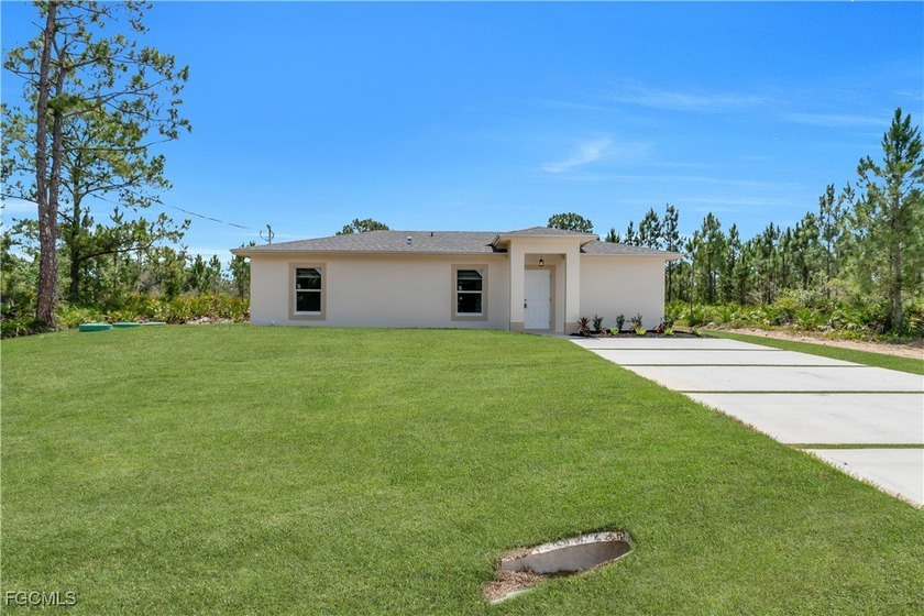 Brand-new modern construction featuring 3 bedrooms and 2 - Beach Home for sale in Lehigh Acres, Florida on Beachhouse.com