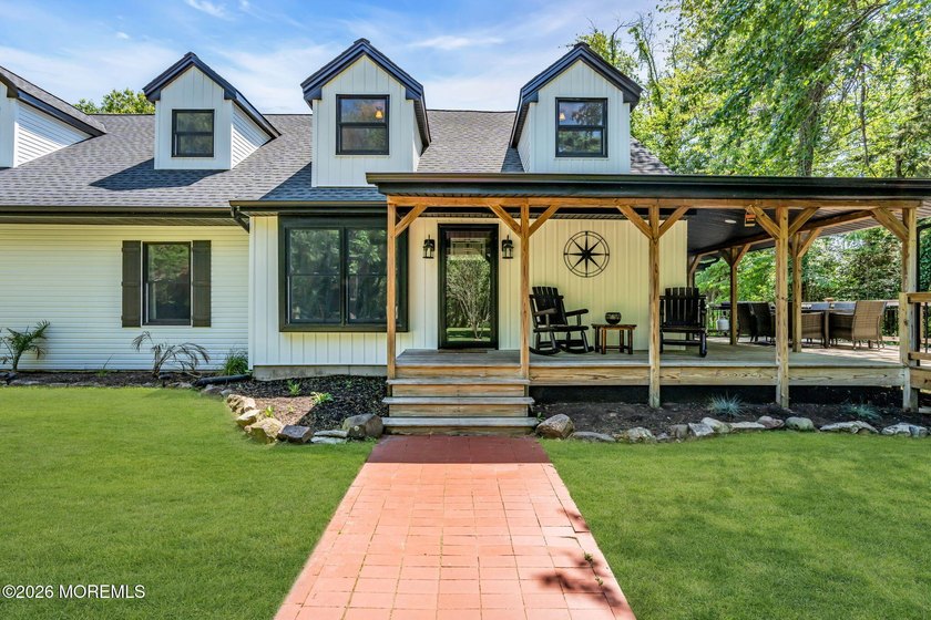 Tucked away on over an acre of private land, this beautifully - Beach Home for sale in Toms River, New Jersey on Beachhouse.com