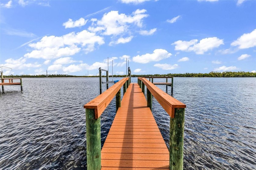 It doesn't get more waterfront than this. Perfectly positioned - Beach Home for sale in Punta Gorda, Florida on Beachhouse.com