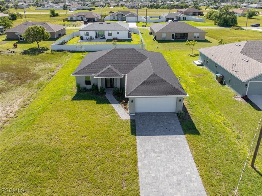 Welcome to 2052 NW 17th Street, a beautifully designed 4-bedroom - Beach Home for sale in Cape Coral, Florida on Beachhouse.com