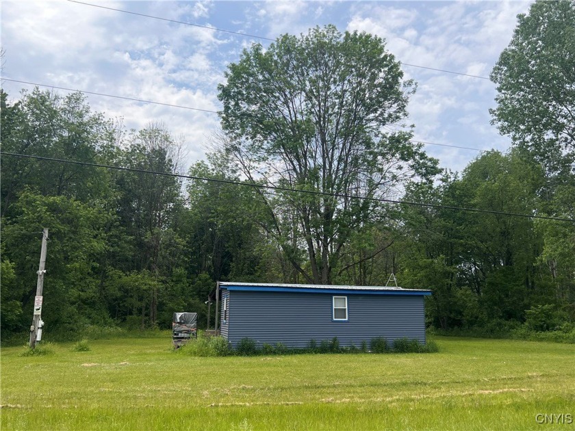 Welcome to a well-maintained seasonal camp nestled in the heart - Beach Lot for sale in Ellisburg, New York on Beachhouse.com