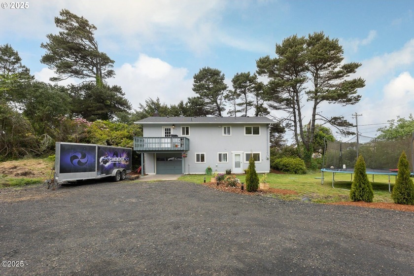 Located on a 1/4-acre corner lot, this updated home offers a - Beach Home for sale in Sealrock, Oregon on Beachhouse.com