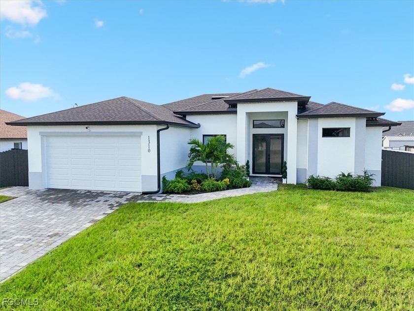Step into style and comfort with this 3-bedroom, 2-bathroom home - Beach Home for sale in Cape Coral, Florida on Beachhouse.com
