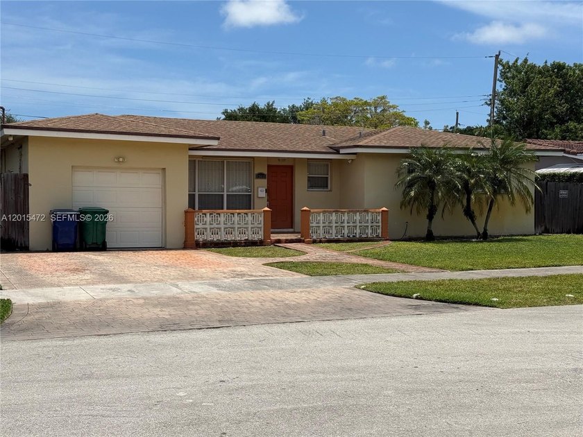 Located on a quiet street in highly desirable Sky Lake, this - Beach Home for sale in Miami, Florida on Beachhouse.com