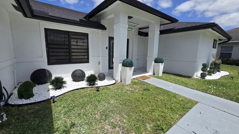 Best location! Beautiful 3-bedroom, 2-bath home with a dedicated - Beach Home for sale in Royal Palm Beach, Florida on Beachhouse.com