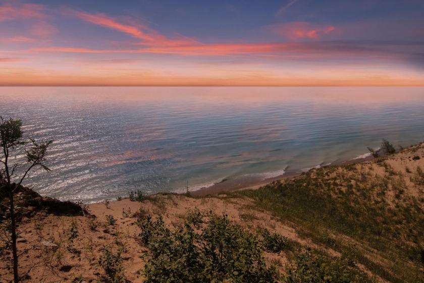 This iconic gray cottage on the bluffs of Lake Michigan and next - Beach Acreage for sale in Arcadia, Michigan on Beachhouse.com