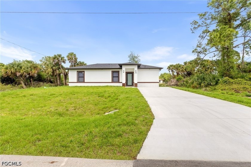 Welcome to this cozy and beautifully designed new construction - Beach Home for sale in Lehigh Acres, Florida on Beachhouse.com