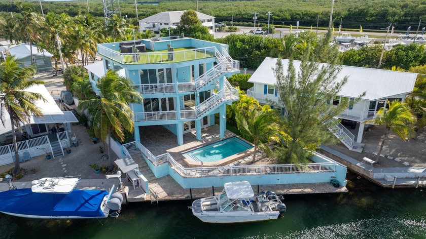 GOLDEN HOUR LIVING - This three level home offers four bedrooms - Beach Home for sale in Key Largo, Florida on Beachhouse.com