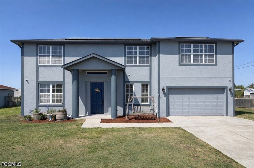 LOW ELECTRIC BILL ALERT! Welcome to this spacious and - Beach Home for sale in Lehigh Acres, Florida on Beachhouse.com