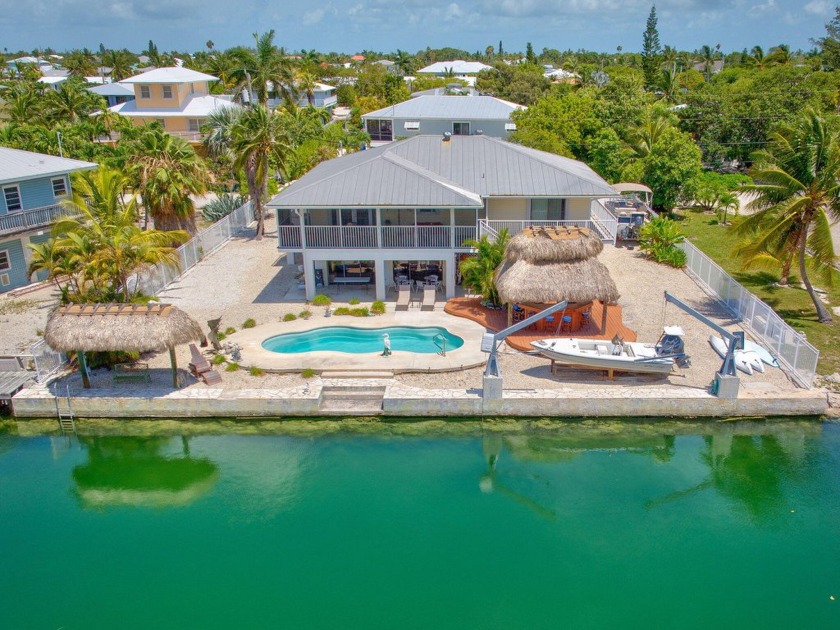 This spacious 1,723 sq. ft. 3 Bedroom 2 Bath canal front Pool - Beach Home for sale in Sugarloaf Key, Florida on Beachhouse.com