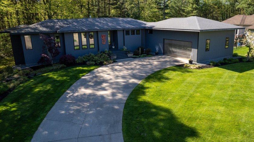 This Mid-Century Modern masterpiece is located near Lake - Beach Home for sale in Grand Haven, Michigan on Beachhouse.com