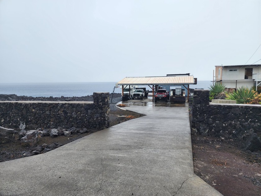 This oceanfront lot is well situated due to the configuration of - Beach Lot for sale in Captain Cook, Hawaii on Beachhouse.com