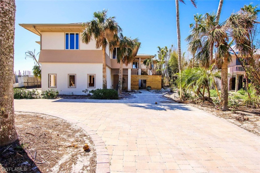 This Gulf Front home is built like a fortress with 20' high - Beach Home for sale in Sanibel, Florida on Beachhouse.com