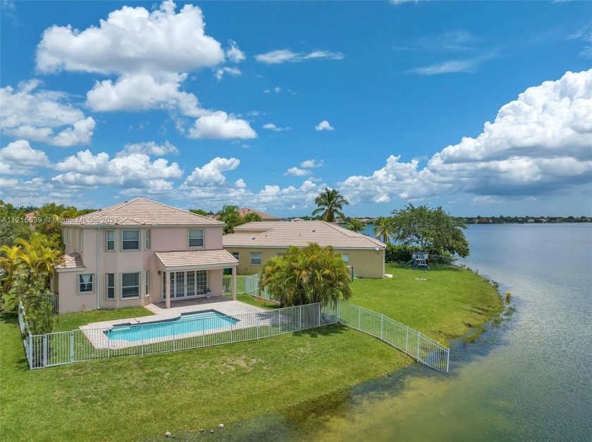 Superb tropical waterfront, pool,4 BR, 2.5 bath home in the - Beach Home for sale in Miramar, Florida on Beachhouse.com