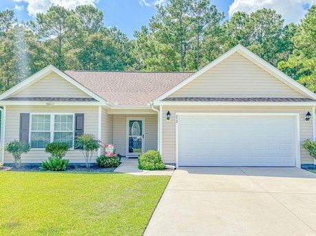 Charming single-level home with River Access and nestled on a - Beach Home for sale in Georgetown, South Carolina on Beachhouse.com