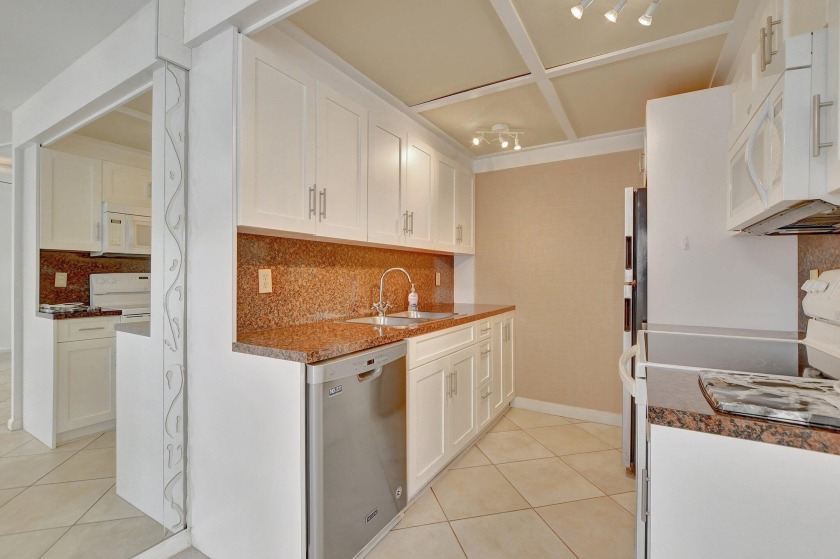 YOU CAN HAVE IT ALL IN THIS CONDO.......UPDATED KITCHEN, STALL - Beach Condo for sale in Boca Raton, Florida on Beachhouse.com