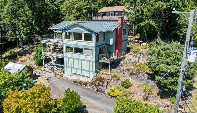 Now's your chance to get into a spacious house with a rare - Beach Home for sale in Pender Island,  on Beachhouse.com