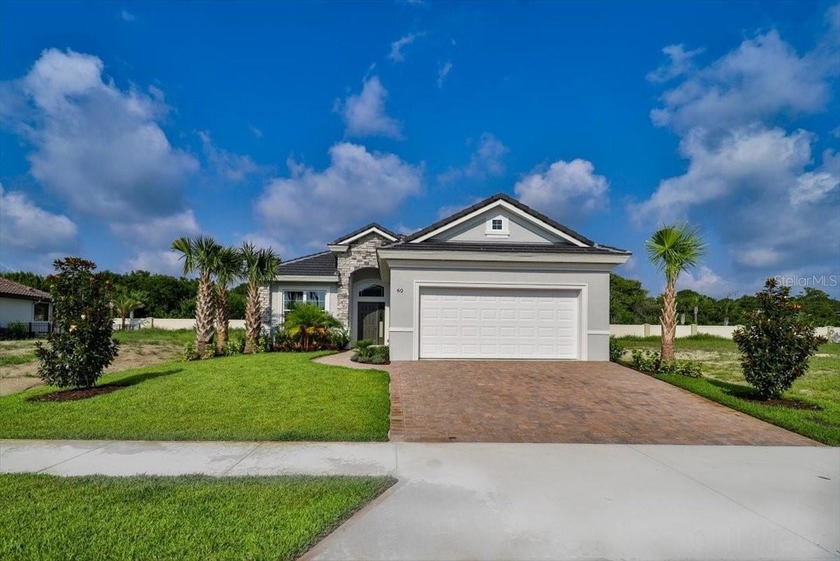 Located at 60 Del Palma Drive in Palm Coast, this brand-new - Beach Home for sale in Palm Coast, Florida on Beachhouse.com