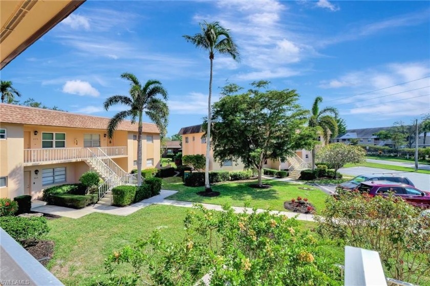 Enjoy a peaceful lake view from your glass enclosed lanai.  This - Beach Home for sale in Naples, Florida on Beachhouse.com
