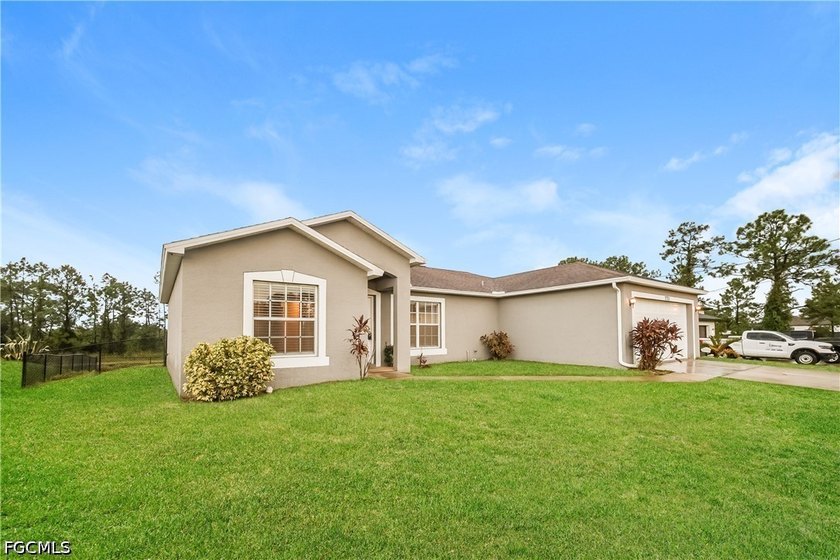 Welcome to this well maintained 4-bedroom, 2-bath home offering - Beach Home for sale in Lehigh Acres, Florida on Beachhouse.com