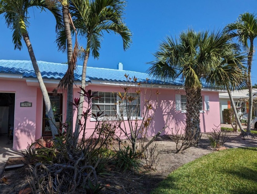 Experience the ultimate beachside lifestyle at 996 Bruce Avenue - Beach Home for sale in Clearwater Beach, Florida on Beachhouse.com