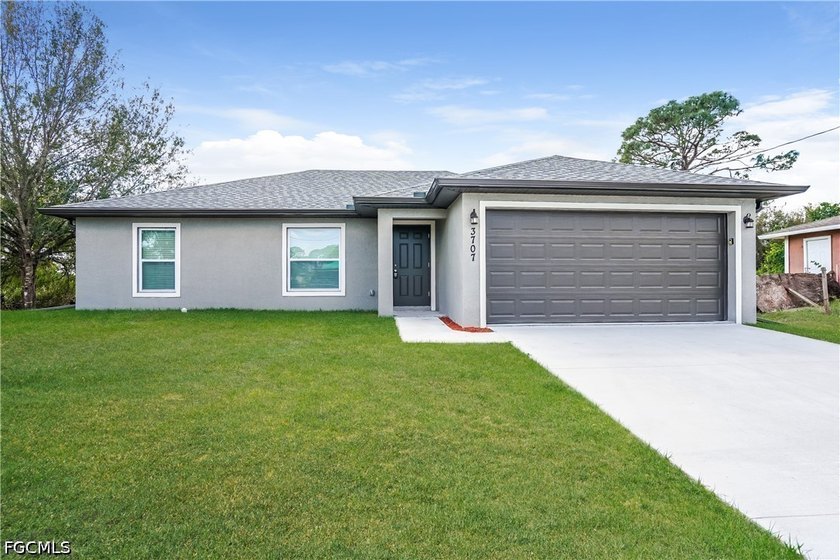 Welcome home! This bright, open-concept newer home features a - Beach Home for sale in Lehigh Acres, Florida on Beachhouse.com