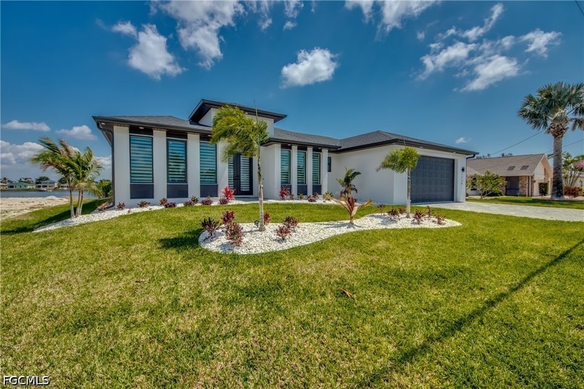 Welcome to Exceptional Lakefront Living This stunning residence - Beach Home for sale in Cape Coral, Florida on Beachhouse.com
