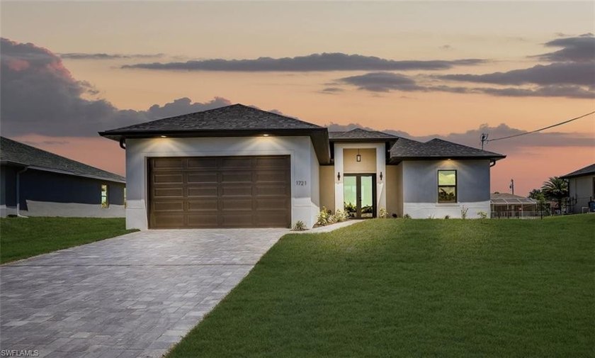 Check out this brand-new construction, move-in ready gem! This - Beach Home for sale in Cape Coral, Florida on Beachhouse.com