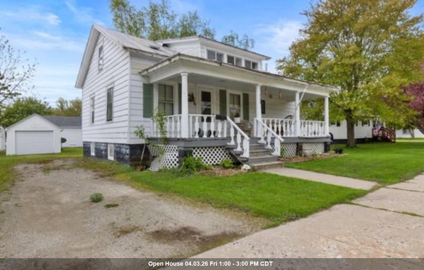 Interior Updated! This 2-bedroom, 1-bath home offers a - Beach Home for sale in Oconto, Wisconsin on Beachhouse.com