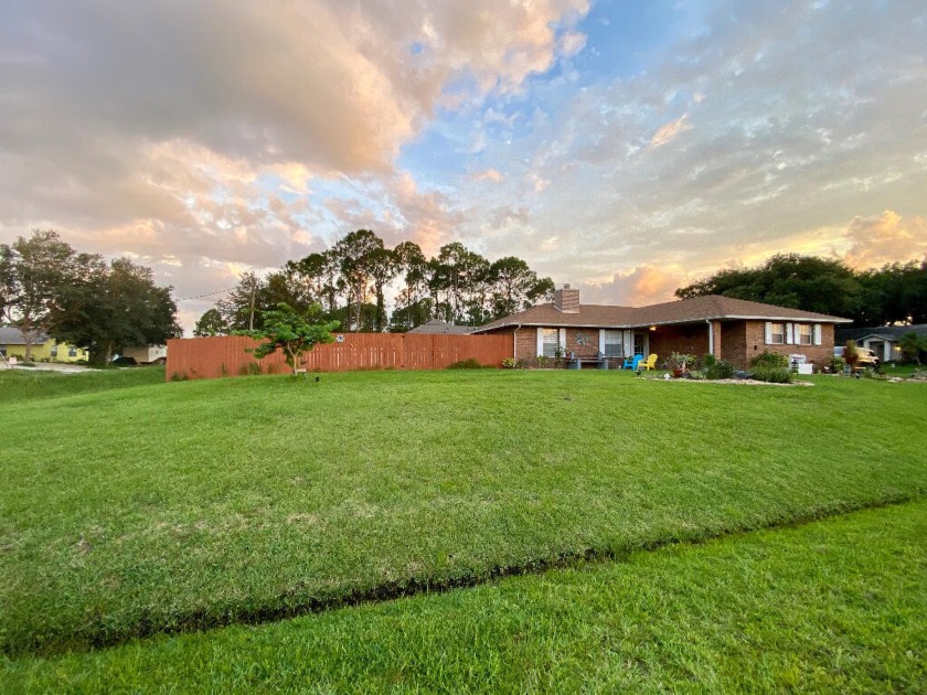 Clean beautiful brick charmer, sitting on a tranquil Large - Beach Home for sale in Palm Bay, Florida on Beachhouse.com