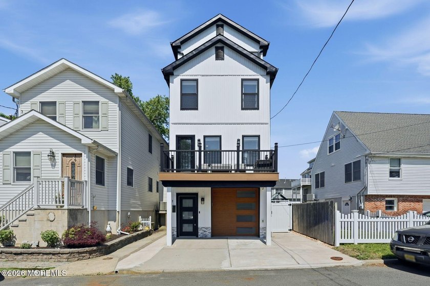 Welcome to 2 Brainard Ave -- an exceptional custom-built coastal - Beach Home for sale in Port Monmouth, New Jersey on Beachhouse.com