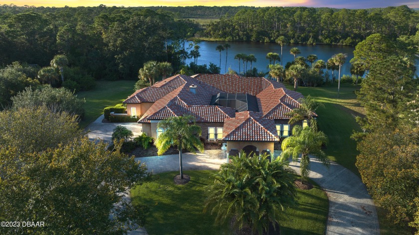 Luxurious Mediterranean Masterpiece! Nestled on a sprawling 1 - Beach Home for sale in Ormond Beach, Florida on Beachhouse.com